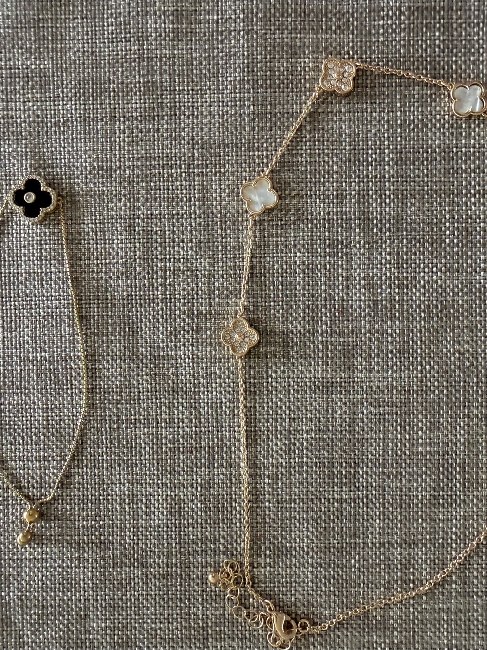 Gold Clover Necklace with Mother-of-Pearl & Black Clover adjustable bracelet